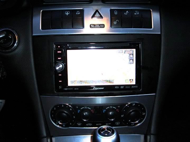 How do you install a new CD player in a Mercedes Benz?