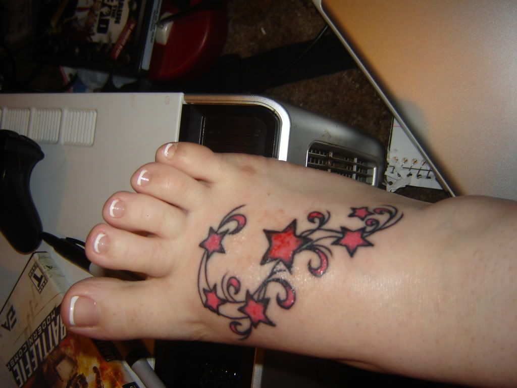 Flower and Star Tattoo Design on Foot Girl