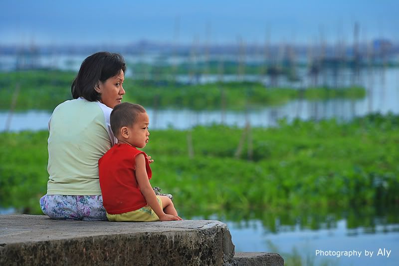 IMAGE: http://i161.photobucket.com/albums/t219/virtualaly/other%20side%20of%20alabang/w-mother-and-son.jpg