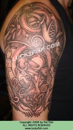 stricking tribal lower back tattoo design. Celtic Custom half sleeve: